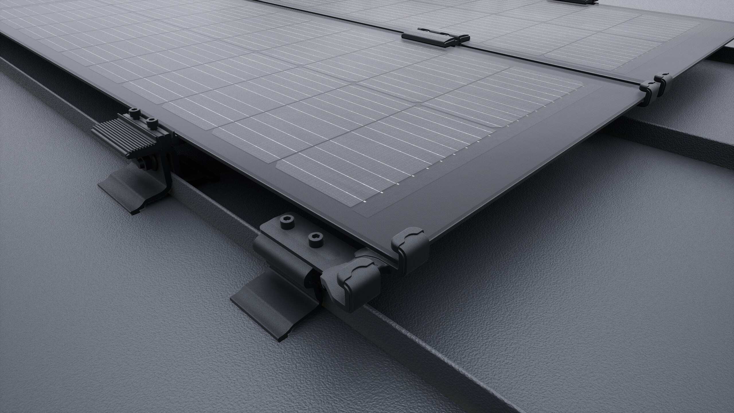 Close-up van het solarmodule PREFALZ met valbeveiliging voor de panelen in zwart. De panelen zijn gemonteerd op het PREFALZ daksysteem, direct op de felsranden. 